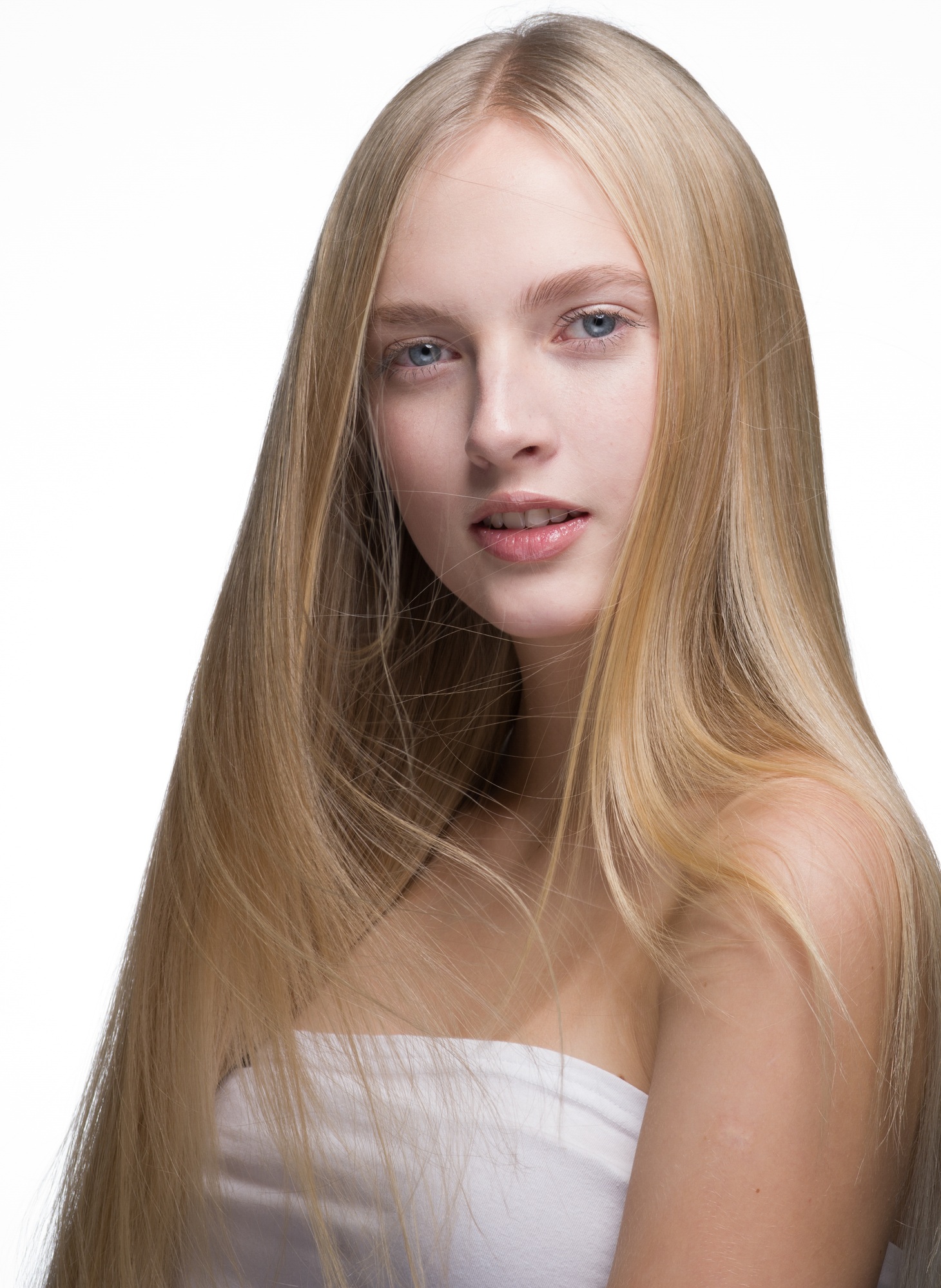 Smooth long hair woman blond natural healthy hairstyle female beauty portrait